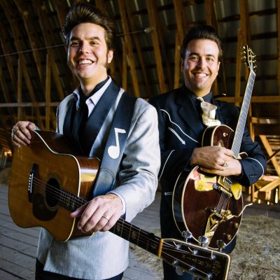 malpass-brothers-smiling-in-the-barn